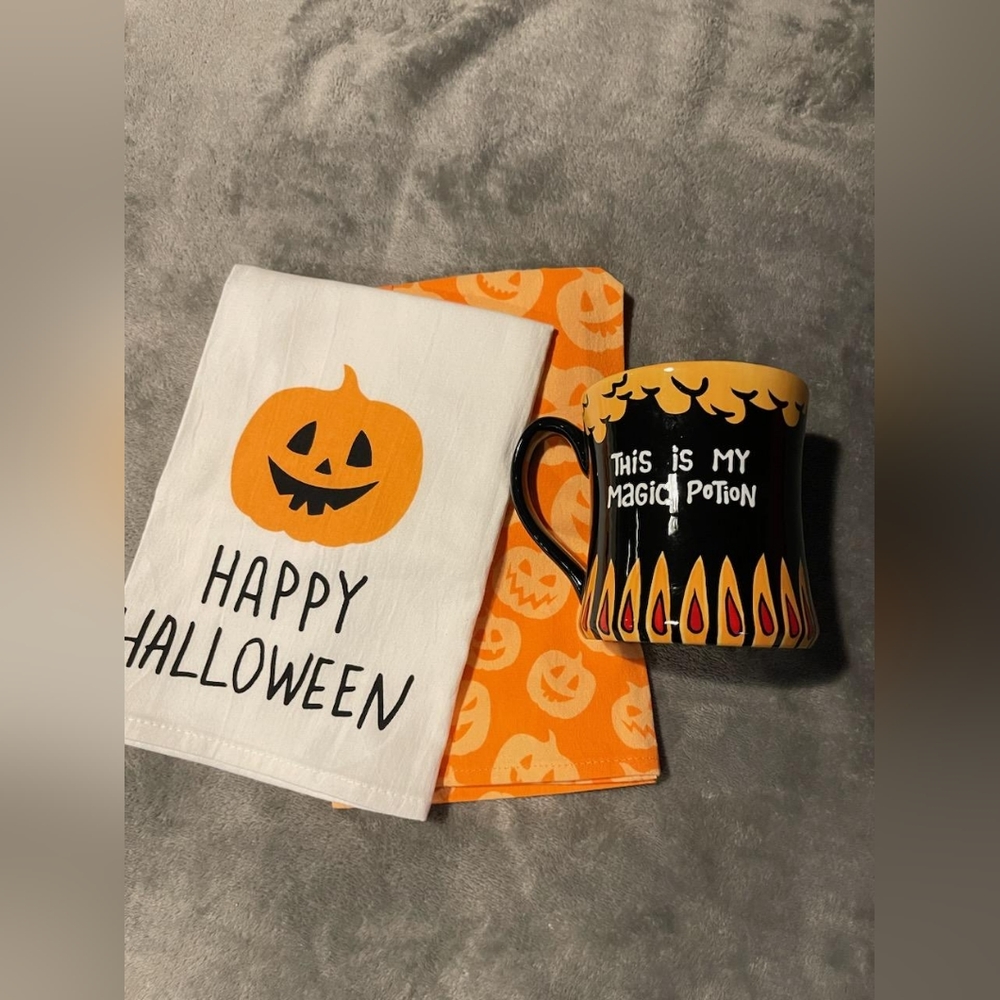 Halloween coffee mug and two towels - this is my magic potion on one side.